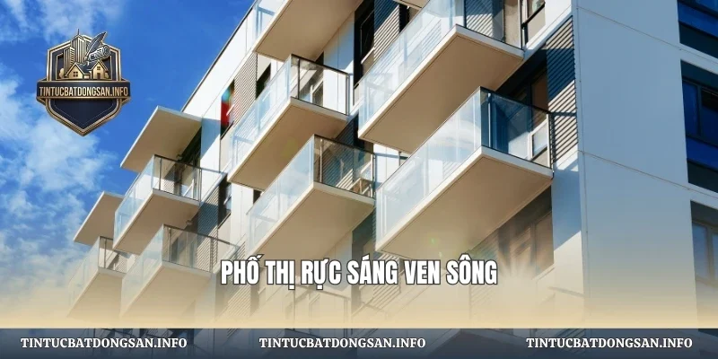 Phố thị rực sáng ven sông